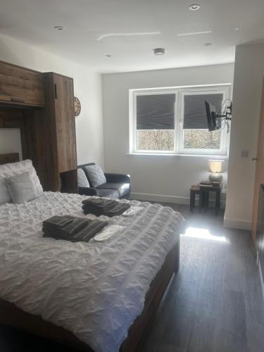 Postel nebo postele na pokoji v ubytování Burnbrae Apartment