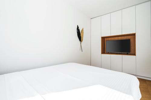 Ένα ή περισσότερα κρεβάτια σε δωμάτιο στο Monte Living by In Property
