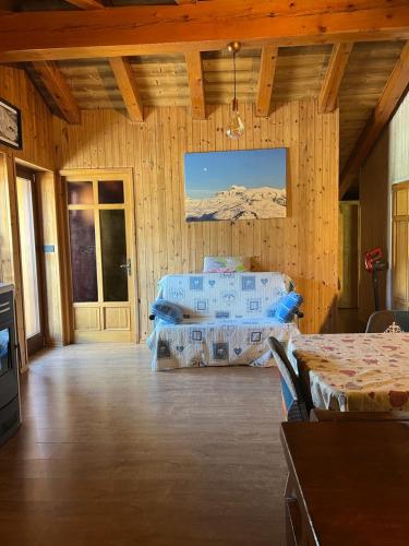 a room with two beds and a view of a mountain at casa del sole in Saint-Pierre