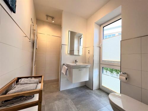 Koupelna v ubytování Apartment Yellow Submarine, Am Alten Deich 26 1