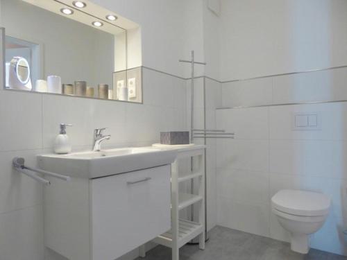 Koupelna v ubytování Apartment Deichgraf, Am Alten Deich 14 5