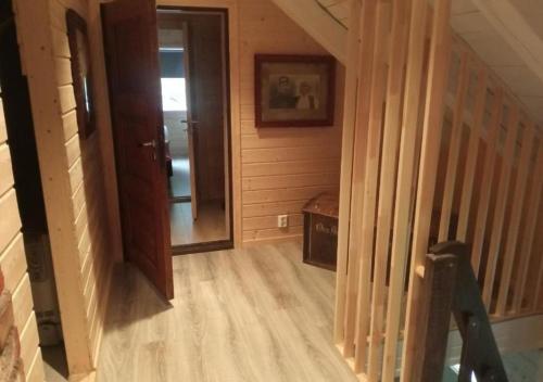 a hallway of a house with a wooden floor at An authentic experience in picturesque Eidfjord in Eidfjord