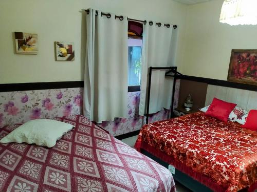 Katil atau katil-katil dalam bilik di Casa de campo Domeni rustica e próximo a cidade de Juiz de Fora MG