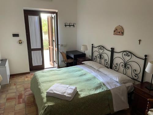 Posteľ alebo postele v izbe v ubytovaní Agriturismo Villa Luca