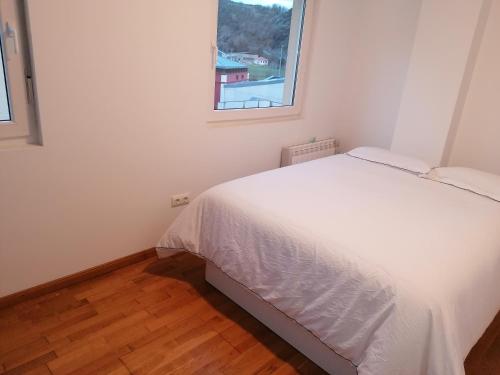 Ένα ή περισσότερα κρεβάτια σε δωμάτιο στο Duplex tres habitaciones Piscina terraza