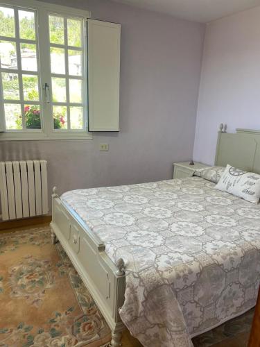 Ένα ή περισσότερα κρεβάτια σε δωμάτιο στο Casa do Cuco, Ribeira Sacra