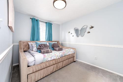 a bedroom with a bed with teddy bears on it at Neptune By The Water in Annapolis