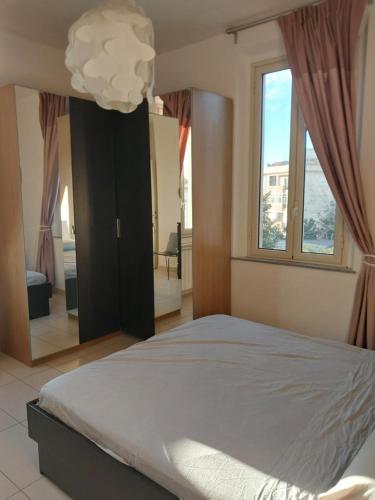 Postel nebo postele na pokoji v ubytování Casa Galileo