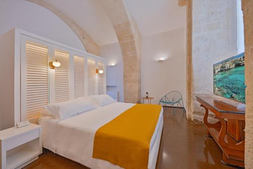 B&B Palazzo Personè Dimora Storicaにあるベッド