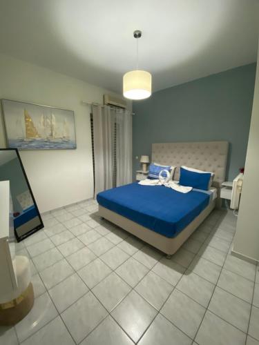 Postel nebo postele na pokoji v ubytování Rethymno Blue Apartments