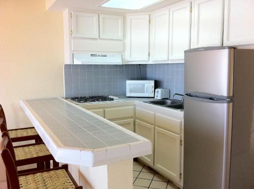 Dapur atau dapur kecil di Quinta Pacifica Beachfront Villas