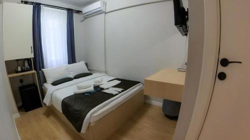 Postel nebo postele na pokoji v ubytování MOF Comfort Edirne