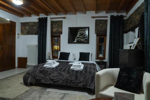 Ένα ή περισσότερα κρεβάτια σε δωμάτιο στο kaimak luxury chalet