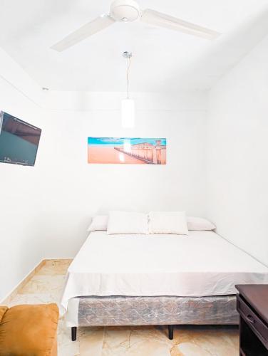 Ένα ή περισσότερα κρεβάτια σε δωμάτιο στο Casa Anastacia