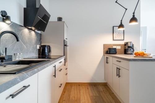 A cozinha ou cozinha compacta de Penthouse Wohnung 3punkt2