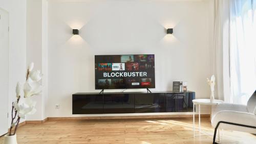 TV a/nebo společenská místnost v ubytování Modern & Zentral - Nähe Düsseldorf & Köln