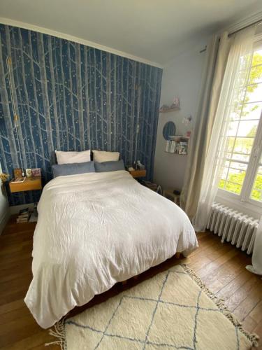 Chambre privée à 12 mn de Paris - Maison de ville