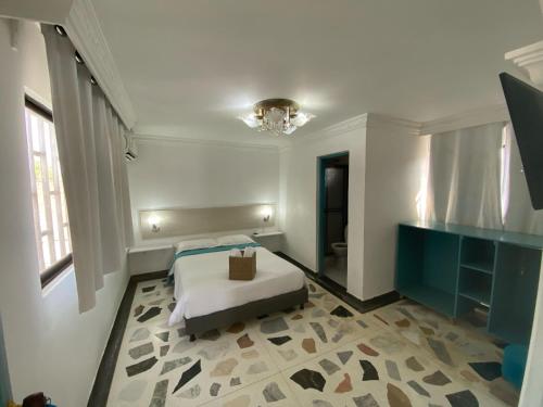 Ένα ή περισσότερα κρεβάτια σε δωμάτιο στο Casa Mirtha