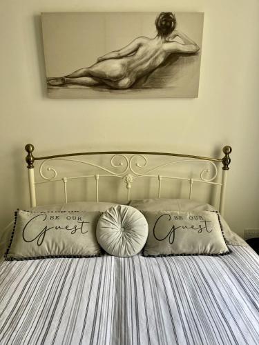 Katil atau katil-katil dalam bilik di Golden Triangle Townhouse