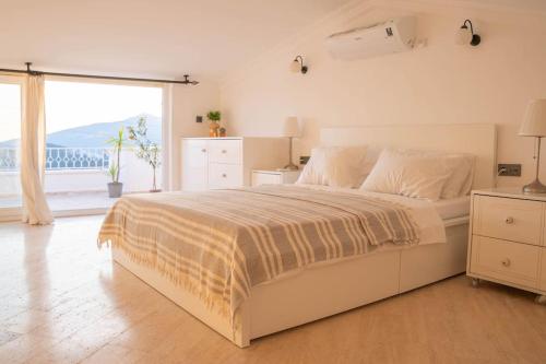 Ένα ή περισσότερα κρεβάτια σε δωμάτιο στο Cetinkaya Apart 3