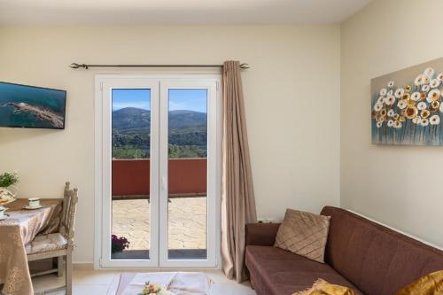 Posezení v ubytování Phevos seaview apartment