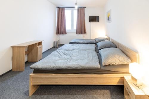 Cama o camas de una habitación en Penzion Fiesta