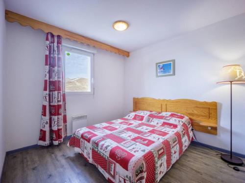 Posteľ alebo postele v izbe v ubytovaní Appartement 8 pers. à Peyragudes, balcon, parking gratuit, près des pistes, animaux acceptés - FR-1-695-7