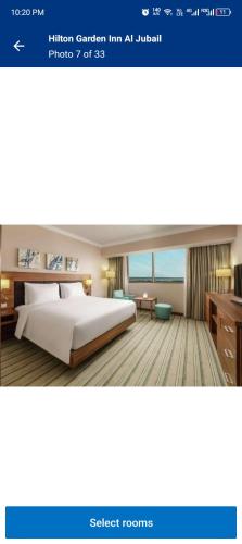 Captura de pantalla de una habitación de hotel con cama en Dealer hotel, en Al Jubayl