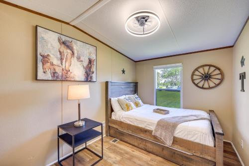 A bed or beds in a room at Ranch House with Grill 5 Mi to Braunig Lake Park!