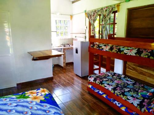 Ένα ή περισσότερα κρεβάτια σε δωμάτιο στο Quinta con alberca
