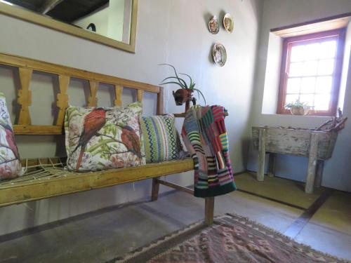 Postel nebo postele na pokoji v ubytování Vensterklip Guest Farm