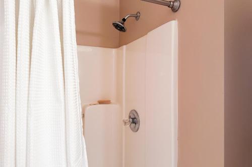 a bathroom with a shower with a shower curtain at Sunset Cove in Maynardville