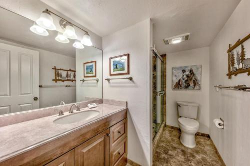a bathroom with a sink and a toilet at Lakeland Village 406 - The Lake Escape in South Lake Tahoe