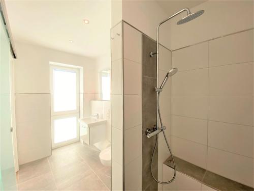 Koupelna v ubytování Ferienwohnung Fiete, Am Alten Deich 4-6, Whg 1 22