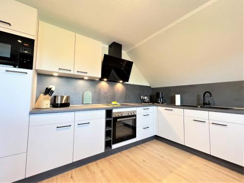 Η κουζίνα ή μικρή κουζίνα στο Apartment FriesenLück