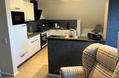 Η κουζίνα ή μικρή κουζίνα στο Apartment FriesenLück
