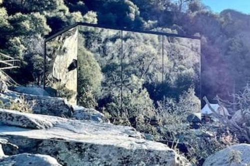 a building on the side of a mountain at Paradise Ranch Inn- Limitless House Hot Tub,Sauna in Three Rivers