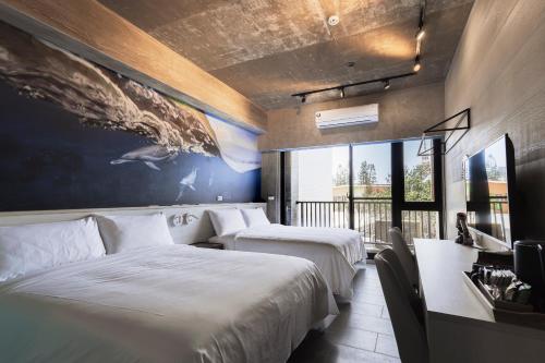 Katil atau katil-katil dalam bilik di Deep Blue 23 B&B