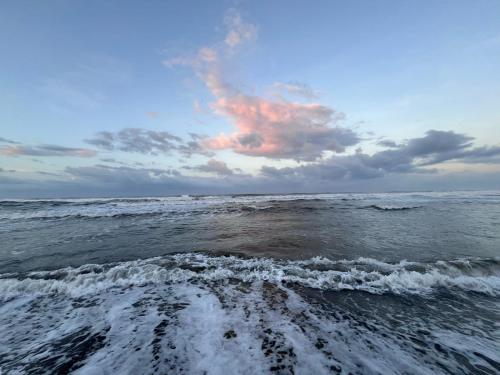a view of the ocean from a boat at Shiosai Retreat Cabins in Gandoca