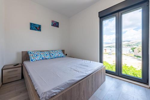 Apartments with parking space Pag - 22609