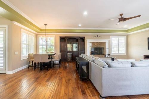 a living room with a couch and a table at Temecula Wine Country Villa in Temecula