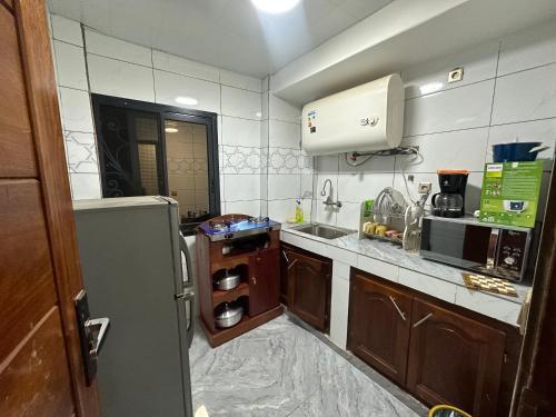 Kuchyň nebo kuchyňský kout v ubytování B&B apartments