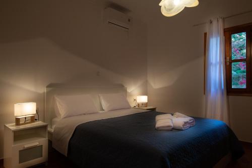 Ένα ή περισσότερα κρεβάτια σε δωμάτιο στο Casa Terra Mani