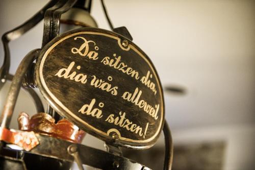 a mirror with the words al shikhomon said alsa wasaidenaidenaiden at Landhotel Steindlwirt in Dorfgastein