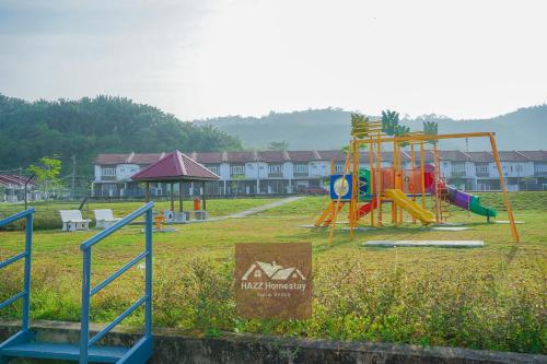 a park with a playground with a slide at HAZZ Homestay Kulim in Kulim