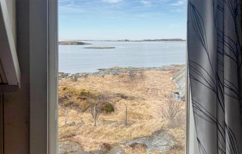 a view of the water from a window at Nice Home In Smøla With House Sea View in Smøla