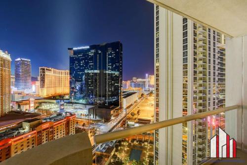 a view of a city skyline at night at MGM Signature-21-701 1Br2Ba F1 Strip View Balcony in Las Vegas