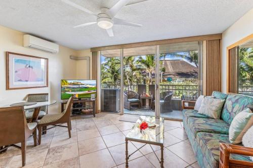 a living room with a couch and a table at Nani Kai Hale 208- Beachfront 1 bedroom 2 bathroom condo, oceanview in Kihei