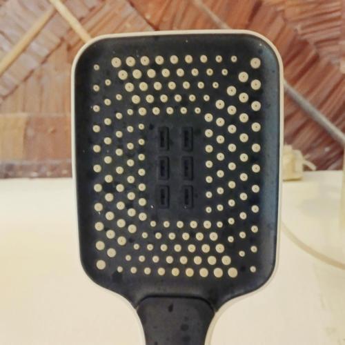 a black object with white polka dots on it at Bunaken 18 Diving Resort and Cafe in Bunaken