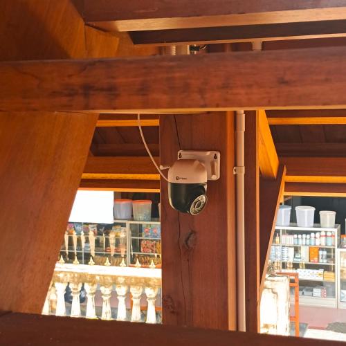 a security camera in front of a refrigerator at Bunaken 18 Diving Resort and Cafe in Bunaken